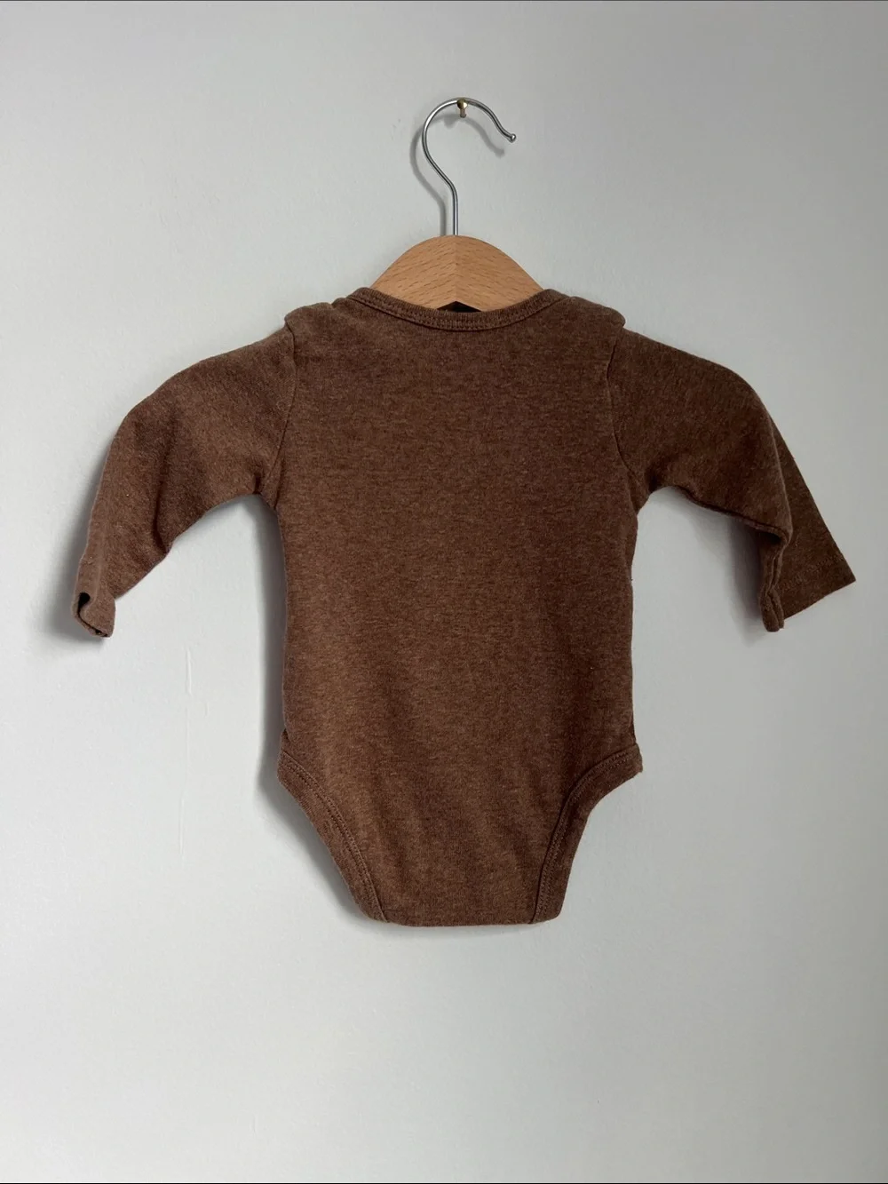 Carter’s | Brown Football-Stitch Long-Sleeve Baby One-Piece Size 3 Months